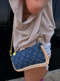 Inspired denim pouch
