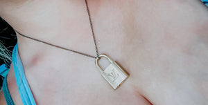 Lv lock necklace